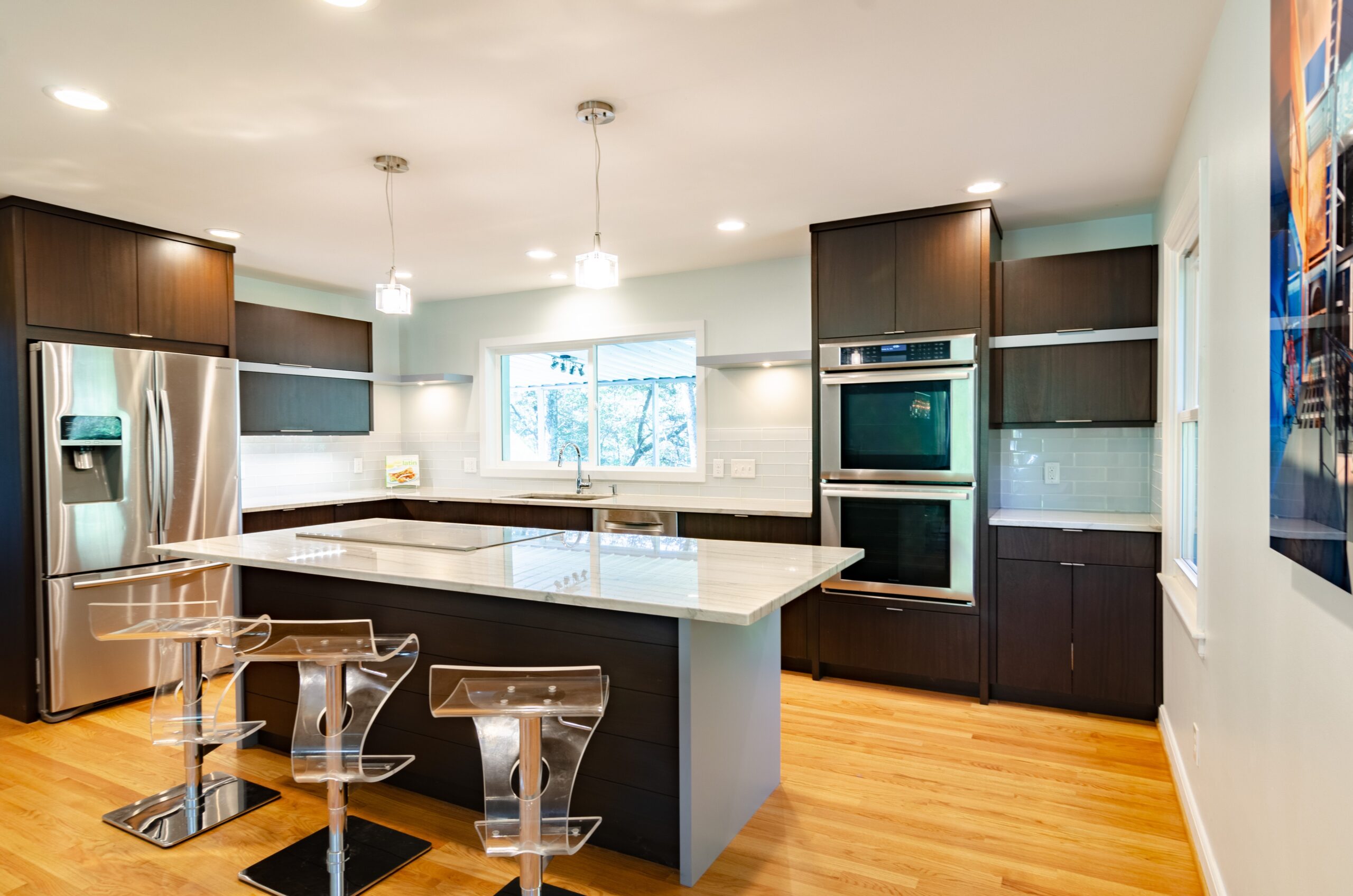 Wooden Kitchen Design with elegant lighting & Wooden cabinets
